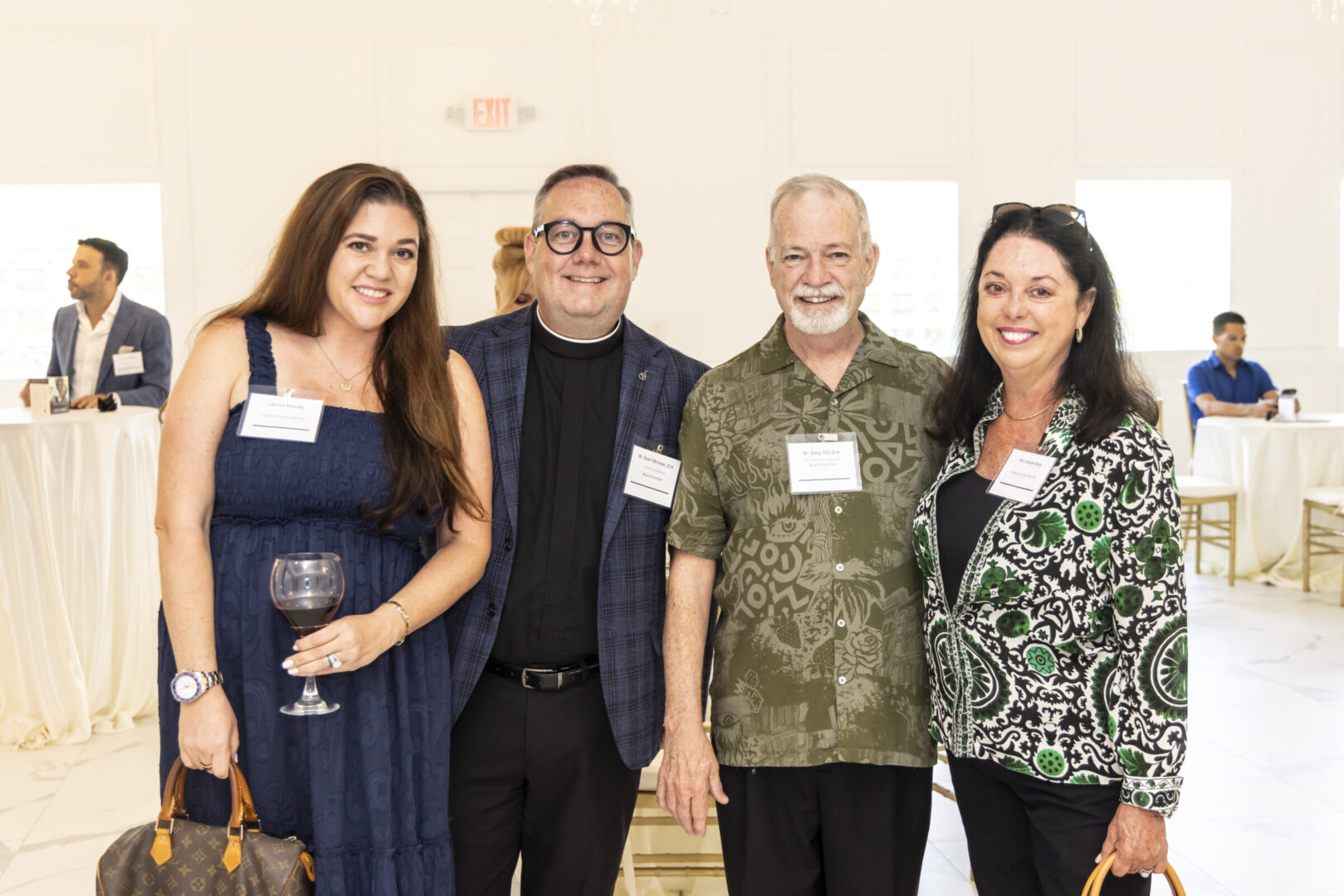 Attendees of the Legacy Society event taking a photo together